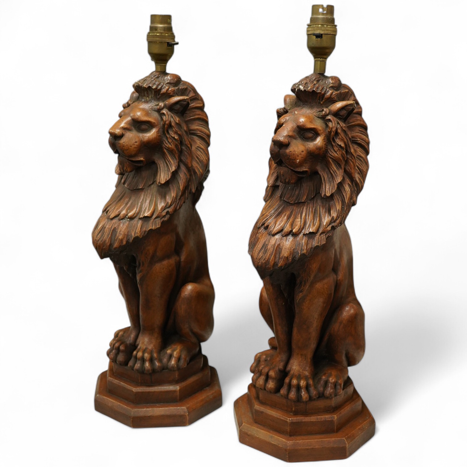 A pair of Thomas Blakemore faux oak 'lion' lamp bases, 47cm high overall. Condition - some minor chips